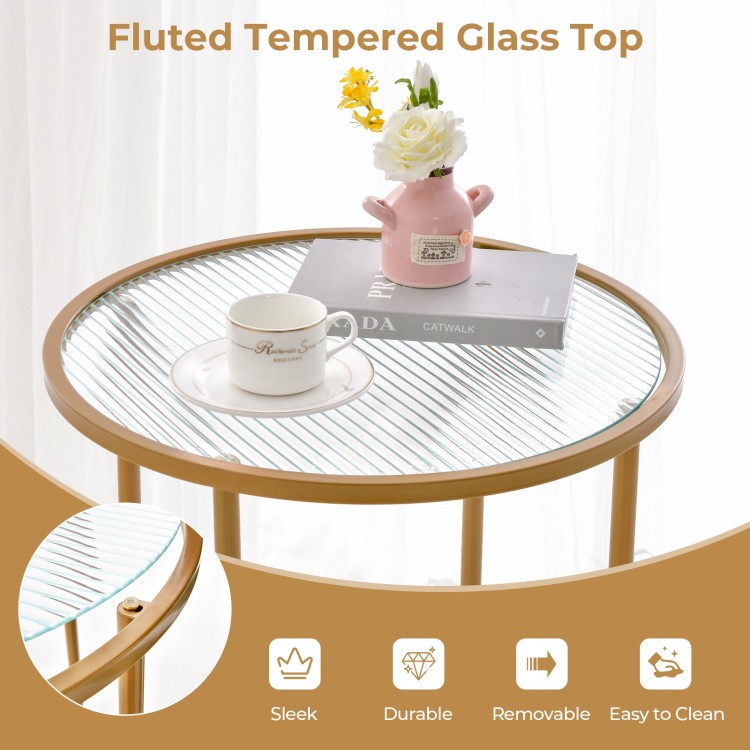Round end table with fluted tempered glass top and gold frame, featuring faux marble shelf for stylish storage.