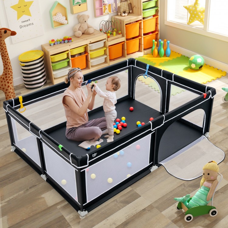 Portable black baby playpen with ocean balls, 81 x 59 inches, featuring mesh walls for interaction and safety zippers.