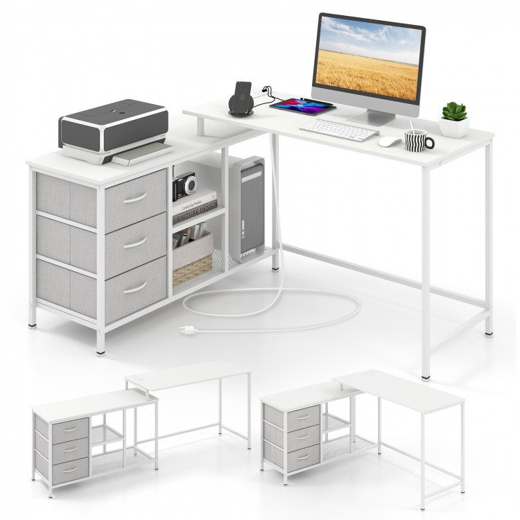 L-shaped computer desk in white with power outlet, featuring spacious surface and 3 fabric drawers for organization.