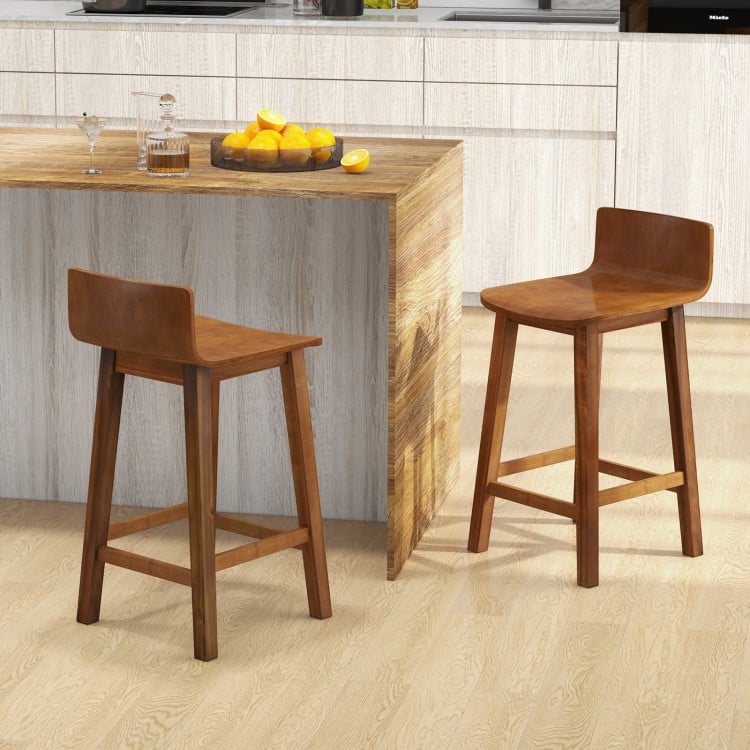 Set of 2 brown wood bar stools with solid back and seat, designed for comfort and stability at kitchen counters.