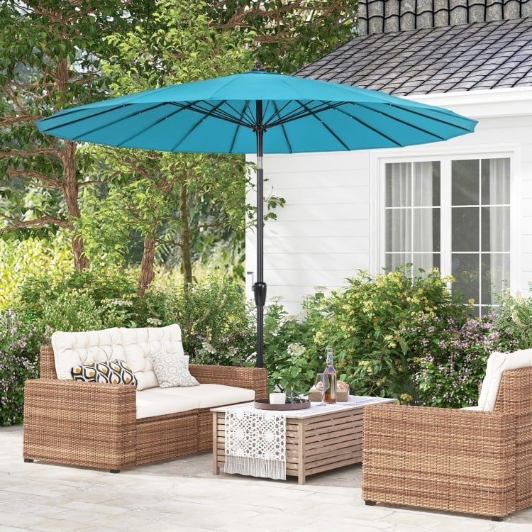 Turquoise 9 feet round patio umbrella with 18 fiberglass ribs, providing UV protection and a tilt mechanism for optimal.