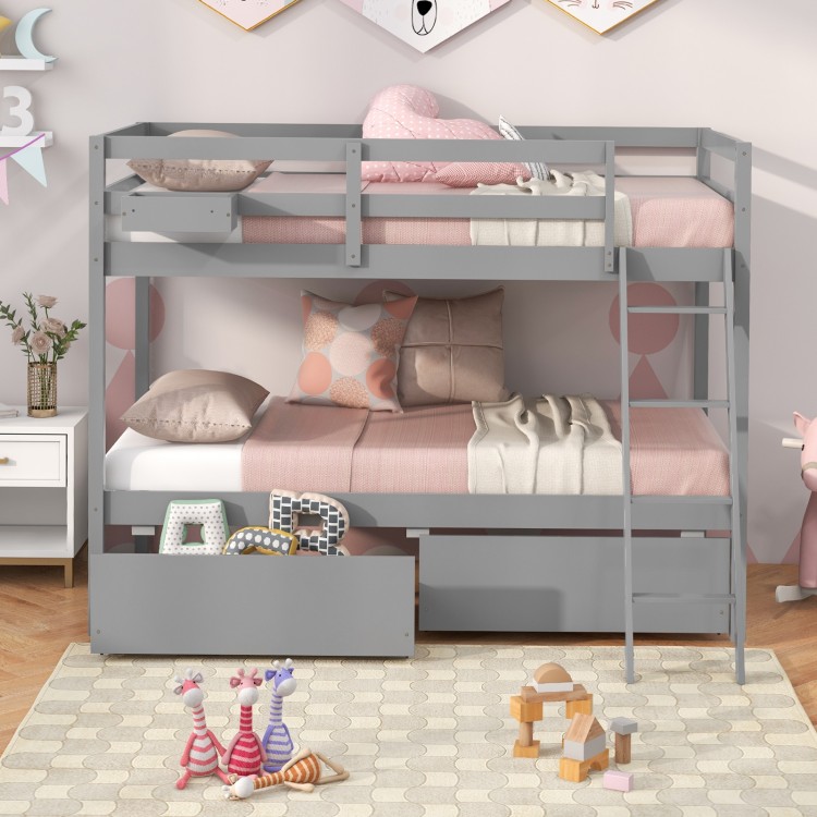 Twin over twin gray bunk bed with storage drawers, sturdy pine wood frame, ideal for kids' rooms or dormitories.