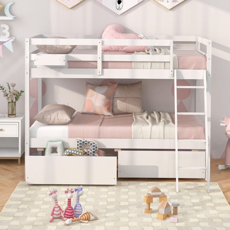 Twin over twin bunk bed in white wood with storage drawers, integrated ladder, and modern design for kids' rooms.