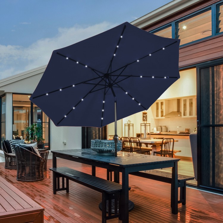 Dark blue 9-foot patio umbrella featuring solar LED lights and a sturdy 1.5" pole, perfect for outdoor dining spaces.