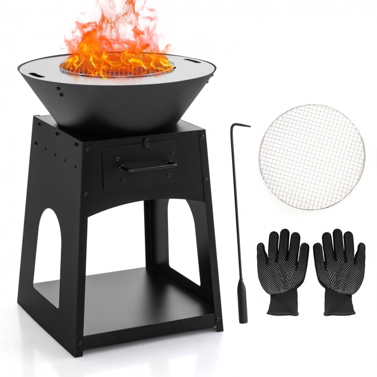 Patio fire pit in black with grill, ash box, and firewood rack, ideal for backyard barbecues and outdoor gatherings.