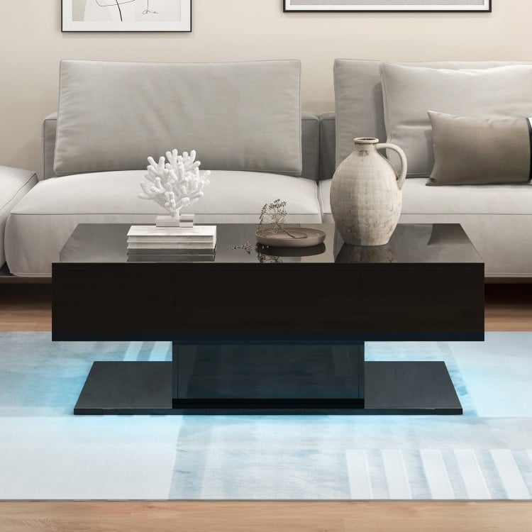 Modern LED coffee table in black with 20 color lights, two storage drawers, and a sleek high-gloss surface for living.