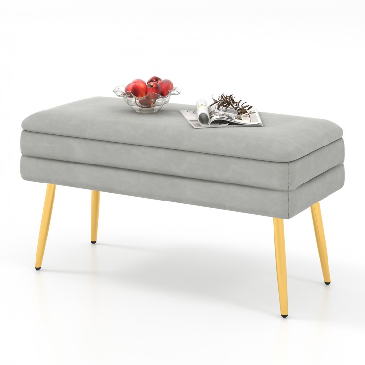 Grey velvet upholstered storage bench with removable top, featuring electroplated metal legs, ideal for living room or.