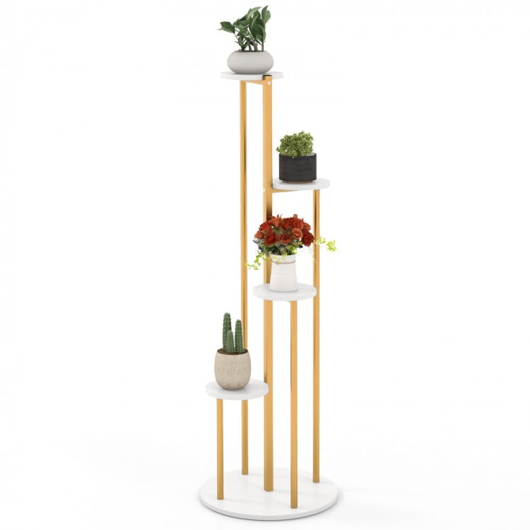 Indoor metal plant stand showcasing a golden frame and white shelves, ideal for stylish plant arrangement in small.