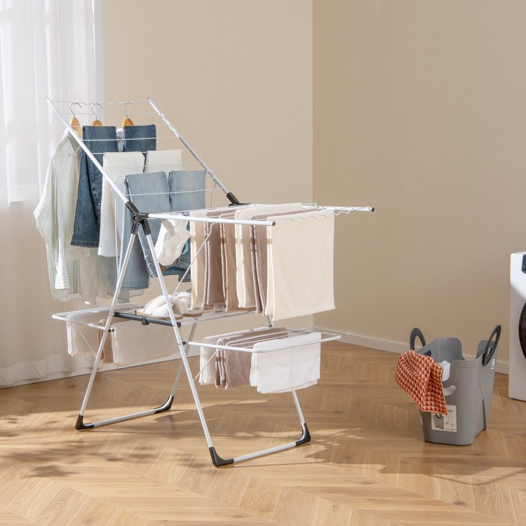 2-level laundry drying rack with adjustable wings, featuring sturdy metal tubes and practical sock clips for efficient.