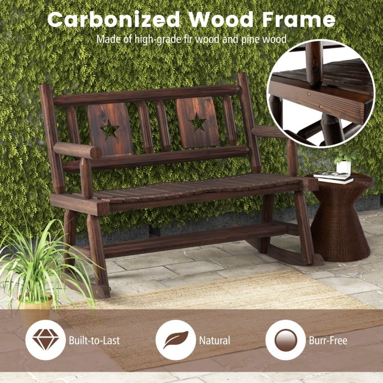 Patio rocking bench with ergonomic seat in rustic brown finish, made of sturdy carbonized wood for outdoor relaxation.