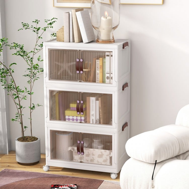 Three-tier stackable storage bins with translucent doors and lockable casters, ideal for versatile organization.