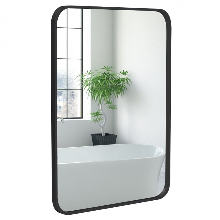 Rectangle wall-mounted mirror with a matte black frame, ideal for bathrooms and living spaces, 24 x 32 inches.