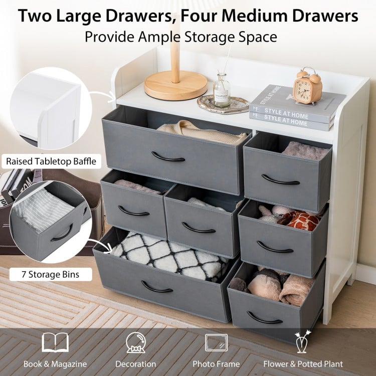 Fabric dresser with 7 drawers in white, featuring two large and four medium drawers for ample bedroom storage.