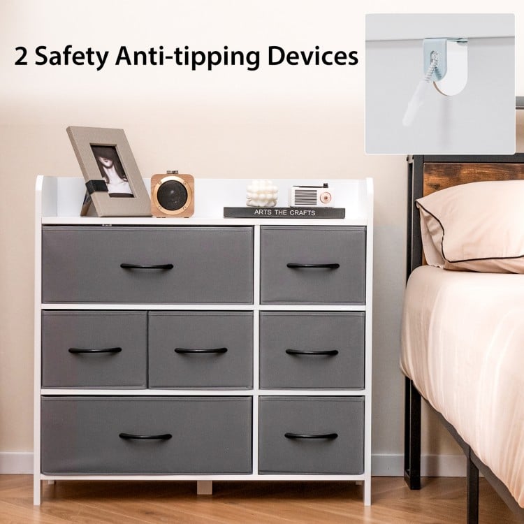 Fabric dresser with 7 drawers in white, featuring durable metal construction and safety anti-tipping devices for.