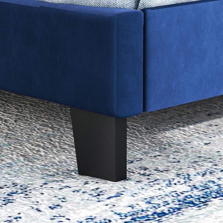 Close-up of the blue velvet bed frame leg with nailhead trim, showcasing sturdy support for queen size mattresses.