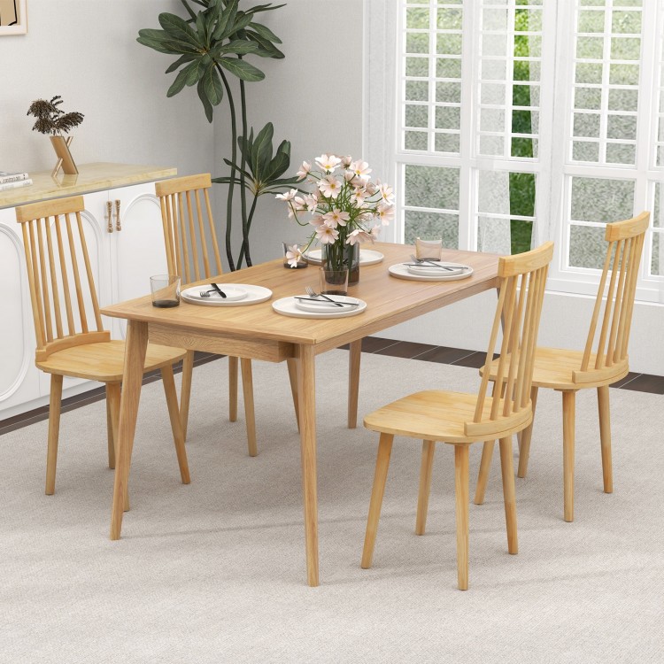 Windsor dining chair showcasing ergonomic spindle back and natural rubber wood legs, designed for comfort and stability.