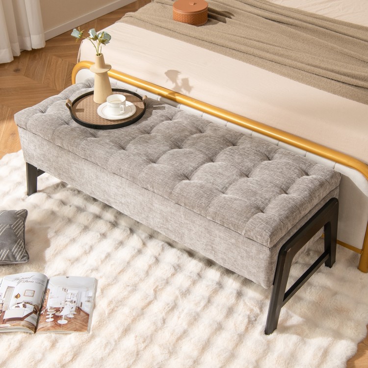Modern gray chenille storage bench with tufted design and rubber wood legs, perfect for a cozy living space.