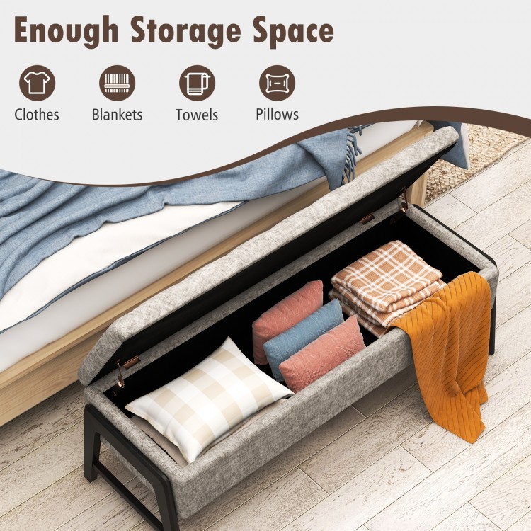 Modern gray chenille storage bench with rubber wood legs, featuring spacious interior for blankets and pillows.