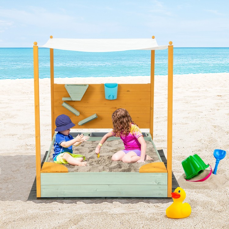 Kids sandbox with removable canopy, solid fir wood, sand wall, and built-in seats for outdoor play at the beach.