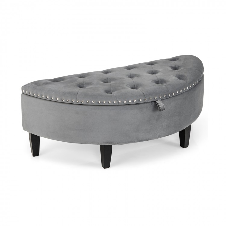 Half-moon storage bench in gray velvet with button tufting and rubber wood legs, ideal for entryways and bedrooms.