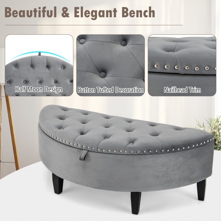 Half-moon storage bench in gray with button tufted top, nailhead trim, and rubber wood legs for stylish organization.
