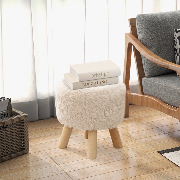 Round faux fur footstool with rubber wood legs, perfect as an ottoman or side table for living room or bedroom use.