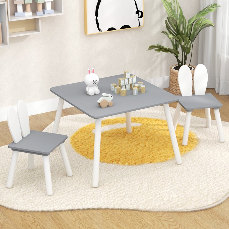 Kids table and chairs set in gray with bunny ear backrests, perfect for arts, crafts, and snack time in playrooms.