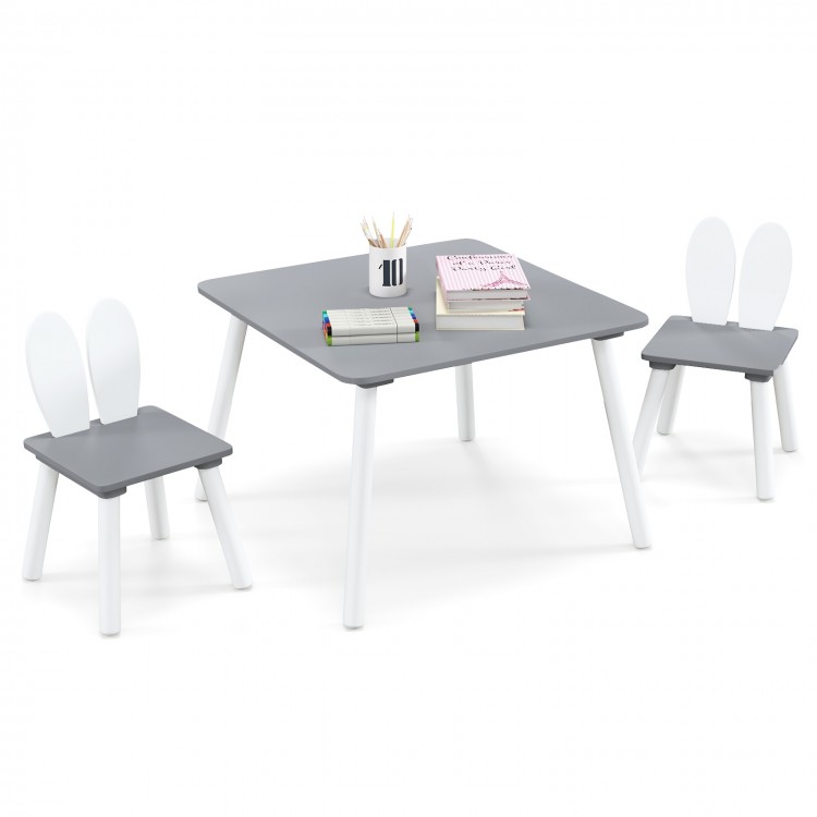 Gray kids chair with a bunny ear backrest, designed for comfort and easy stacking under the table for space-saving.