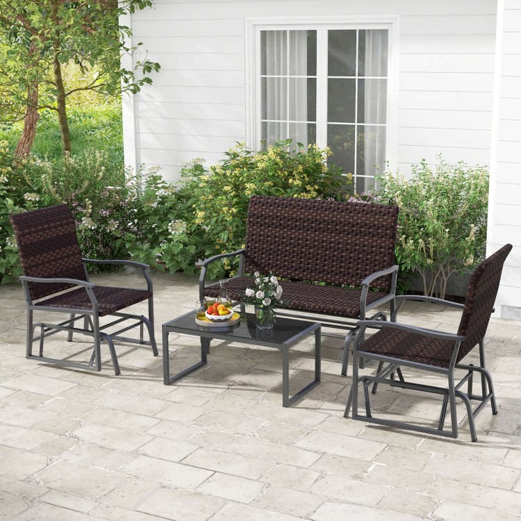 4-piece patio gliding set with brown wicker, cushioned seats, and tempered glass coffee table for outdoor relaxation.