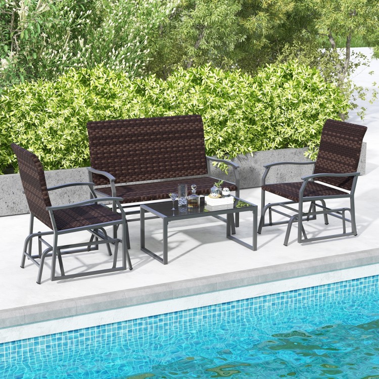 4-piece patio gliding set with brown wicker, tempered glass coffee table, ideal for poolside relaxation.