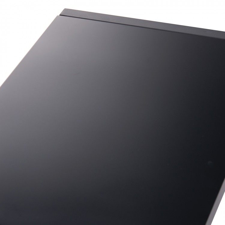 Tempered glass tabletop of the 4 Piece Patio Gliding Set, featuring a sleek design for easy cleaning and durability.