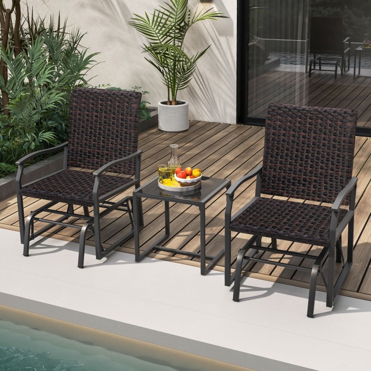 3-piece patio gliding set with brown rattan chairs and tempered glass coffee table, perfect for outdoor relaxation.