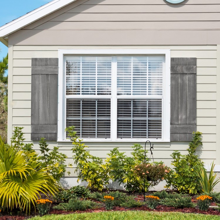 Dark gray farmhouse window shutters made of durable paulownia wood, enhancing window decor for living spaces.