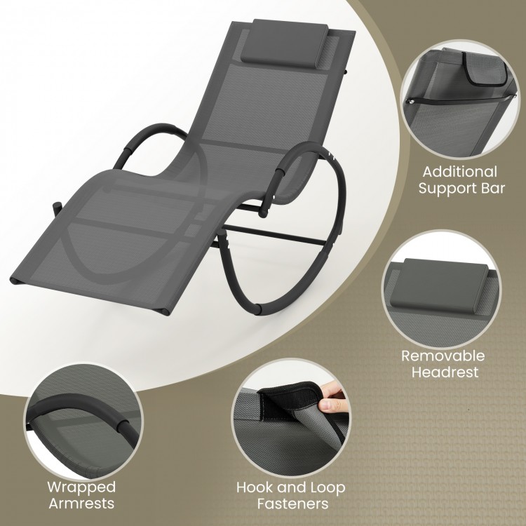 Outdoor rocking lounge chair in gray with removable headrest, ergonomic design, and solid metal frame for stability.