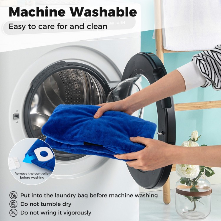 Weighted heating pad in blue being placed in a washing machine, showcasing its machine washable feature for easy care.