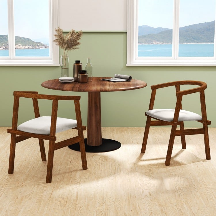 Set of 2 walnut dining chairs with wrap-around armrests, featuring breathable fabric and sturdy rubber wood frame.