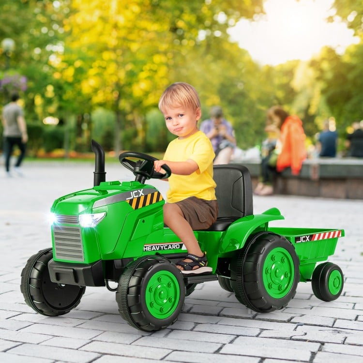 Kids ride-on tractor in green with detachable trailer, featuring remote control and premium wheels for outdoor fun.