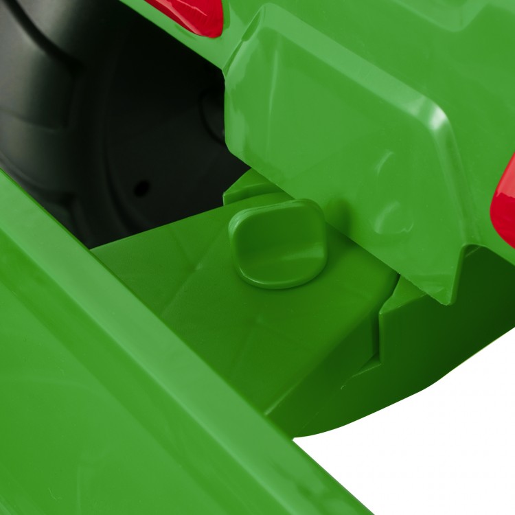 Close-up of the green 12V kids ride-on tractor's trailer attachment, featuring a secure latch for safe use.