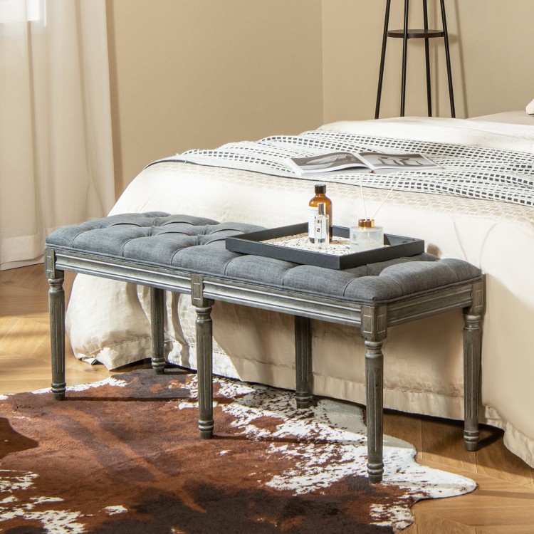 French vintage upholstered dining bench in gray with button tufting, perfect for entryway or end-of-bed use.