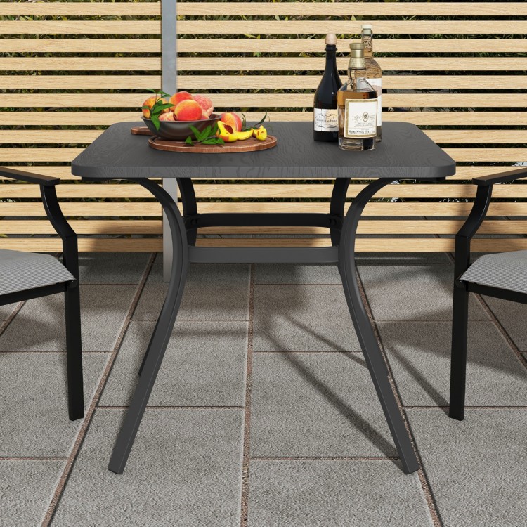 Gray 32-inch patio dining table with wood-like textured top and curved legs, perfect for outdoor dining.