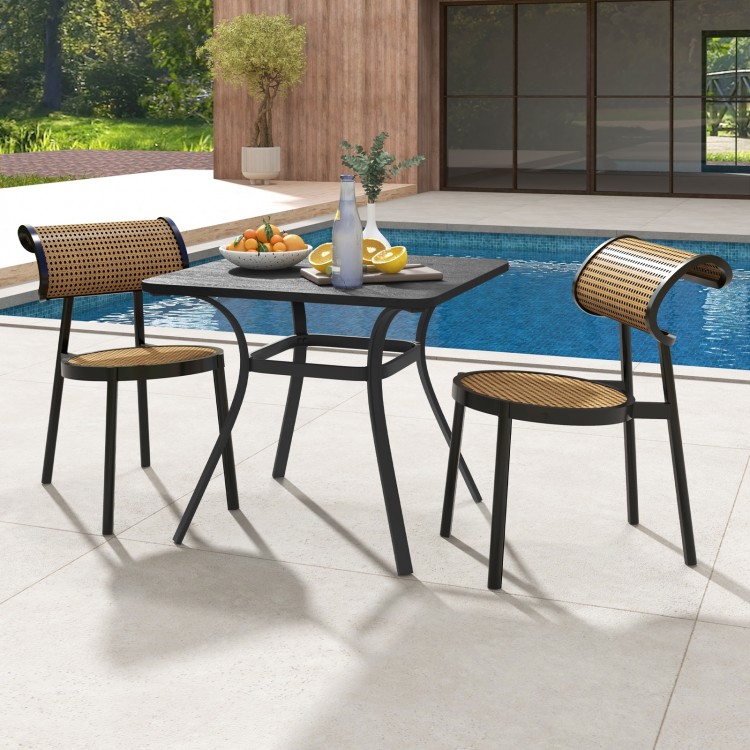 Metal square patio dining table with wood-like textured top, seating 4, ideal for backyard or poolside use.