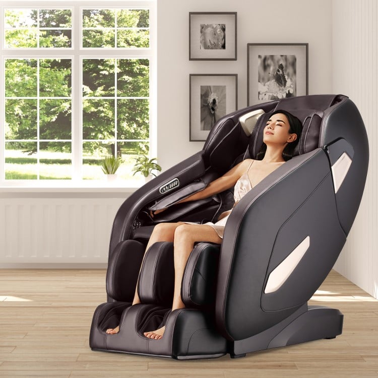 Full body zero gravity shiatsu massage chair in coffee color, designed for ultimate relaxation in any room.