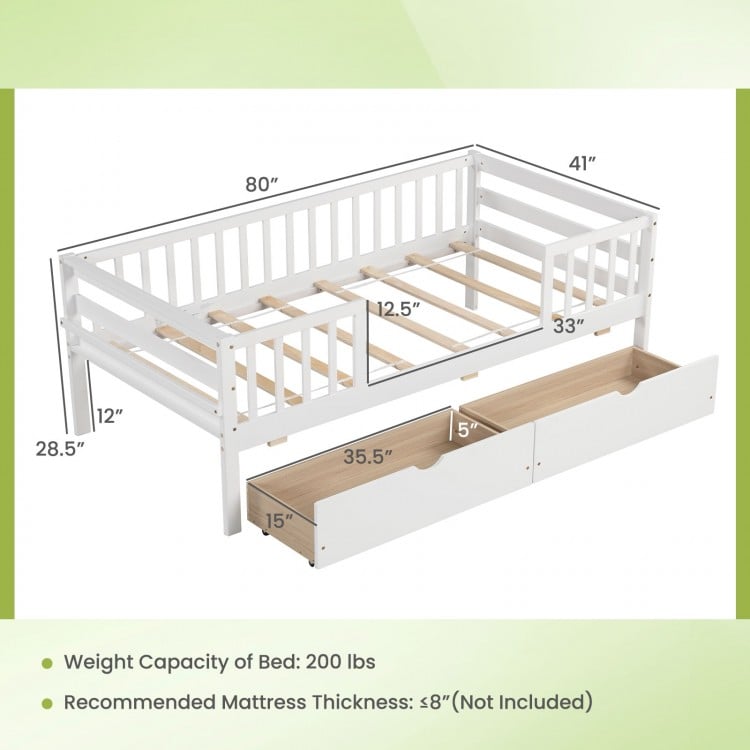 Twin daybed in white with fence, featuring two spacious drawers for storage, ideal for kids' rooms.