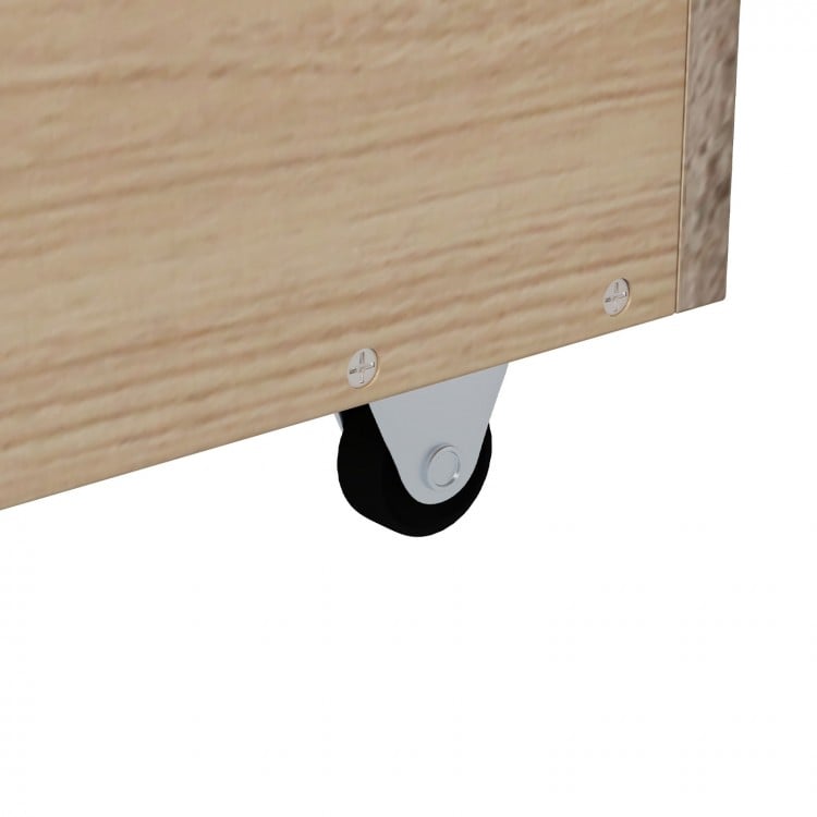 Close-up of the caster wheel on the Twin Daybed with Fence, designed for easy drawer access and mobility.