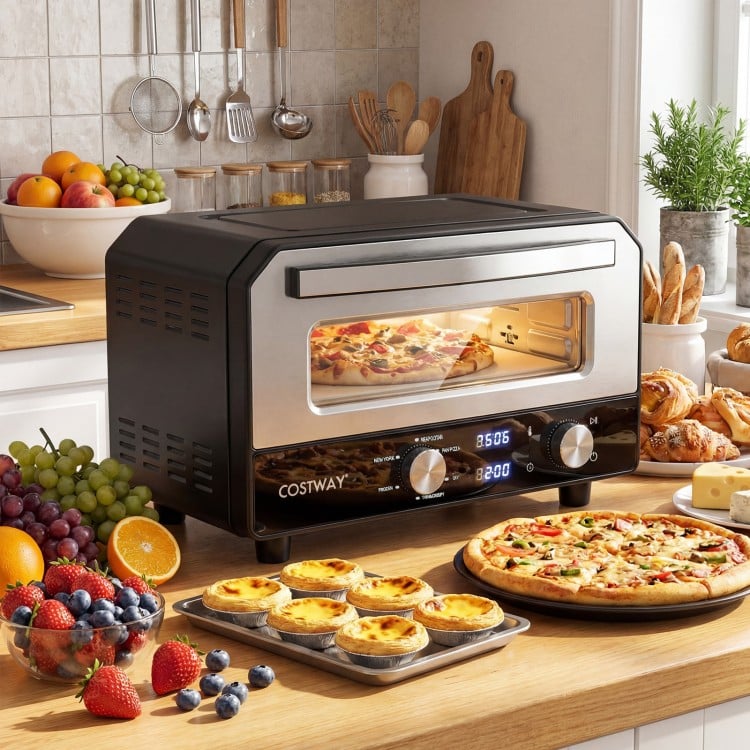 Indoor electric pizza oven in black, featuring a glass window and dual knobs, perfect for 12-inch pizzas on countertops.