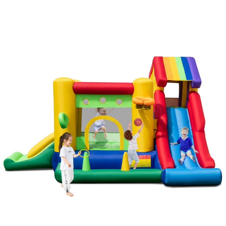 Colorful inflatable bounce castle with double slides, climbing wall, and games for kids' outdoor fun and play.