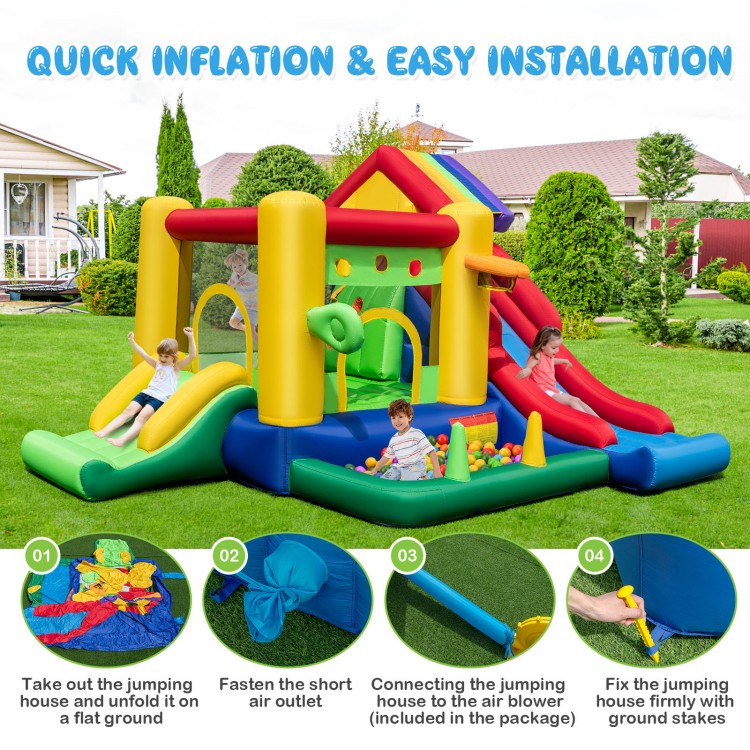 Colorful inflatable bounce castle with double slides, climbing wall, and ocean ball pool for outdoor fun.