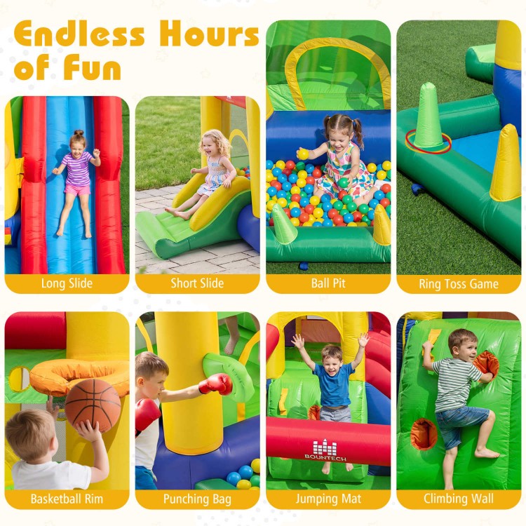 Rainbow inflatable bounce castle featuring double slides, climbing wall, and ball pit for endless outdoor fun.