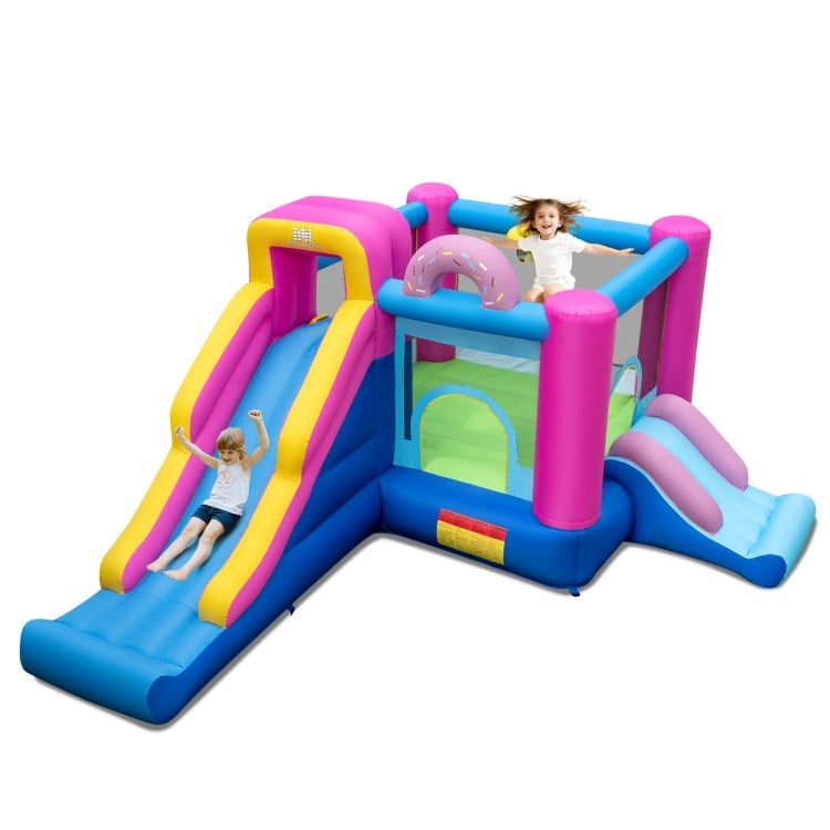 Inflatable bounce house with slides and basketball hoop, featuring vibrant colors and a large jumping area for kids'.