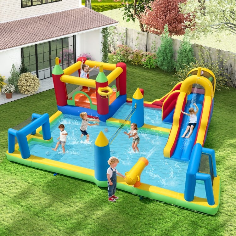 Bright inflatable water slide bounce house with climbing wall, featuring mesh walls and safety guardrails for secure.